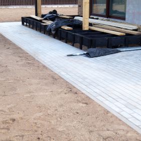 Laying paving